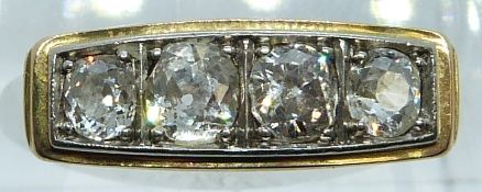 A 14ct gold ring set with four old cut diamonds of approximately 0.35ct, 0.35ct, 0.25ct & 0.23ct,