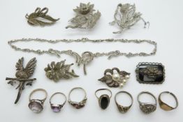 A collection of silver rings, marcasite brooches and marcasite necklace by Sphinx