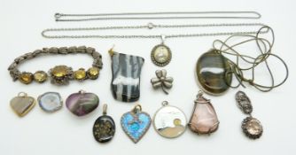 A white metal bracelet, rose quartz pendant, flourite pendant, tiger's eye pendant, pendants, etc