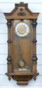 German Vienna regulator style wall clock, the Roman chapter ring with gilt bezels, the case with