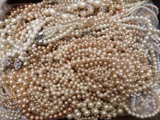 A collection of faux pearl necklaces, vintage and modern paste/ diamanté