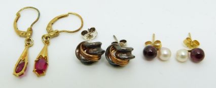 A pair of 9ct gold knot earrings and a pair of 9ct gold earrings set with a garnet and pearl to each