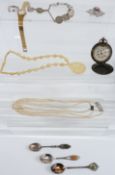 A collection of costume jewellery including faux pearls, brooch, compass, white metal bracelet, etc