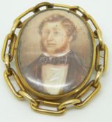 Victorian swivel mourning brooch set with a portrait miniature, verso set with hair, 5.4 x 6.2cm