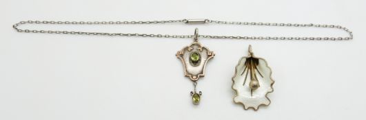 Norwegian silver pendant in the form of a lily set with white enamel and a silver and 9ct gold