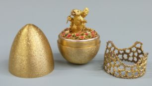 Stuart Devlin limited edtition hallmarked silver gilt egg on stand, with bark effect exterior and
