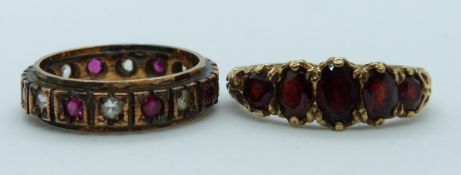 A 9ct gold ring set with five garnets and a 9ct gold eternity ring, 6.9g