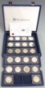 Twenty two limited edition Westminster Coins Lifetime of Service silver proof crowns, $5,£5 etc,