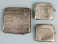 Two large hallmarked silver vesta cases, one Birmingham 1901 the other 1913, together with a