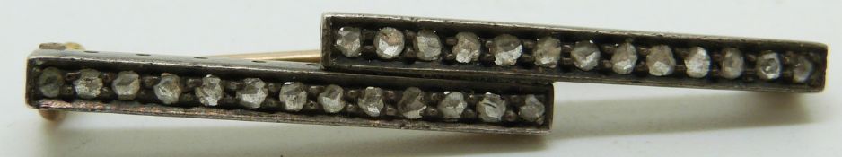 Victorian brooch set with two rows of rose cut diamonds, length 4cm