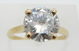 A 9ct gold ring set with a round cut cubic zirconia, 4.1g, size N