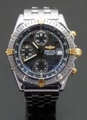 Breitling Chronomat gentleman's automatic chronograph wristwatch ref. B13352 with date aperture,