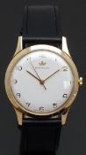 Marvin 9ct gold gentleman's wristwatch with gold hands and Arabic numerals, silver dial and signed