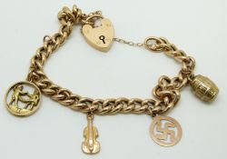A 9ct gold charm bracelet with four 9ct gold charms including cello, barrel, etc, 17.2g