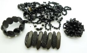 A collection of jet jewellery including Victorian bracelets, Art Deco French jet and crystal, West
