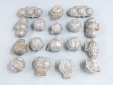 Seventeen pewter/metal catering/decorating moulds