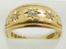 Edwardian 18ct gold ring set with three diamonds in a star setting, Chester 1906, 3.1g, size M