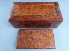 An inlaid Amboyna humidor with lift out tray, width 40cm, and a backgammon set