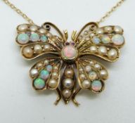 Edwardian 15ct gold pendant / brooch in the form of a butterfly set with opals, seed pearls and ruby