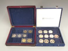 Eight Millionaires Collection coins in wooden collector's case and fifteen Westminster Coins