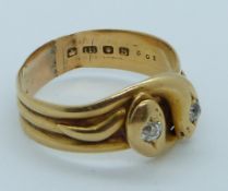 An 18ct gold serpent ring set with two diamonds, London 1893, 5.9g, size S/T