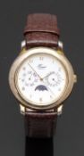 Hermes gentleman's wristwatch with moonphase, day and date sub dials, gold hands and Arabic
