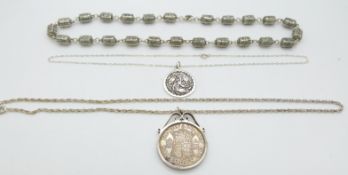 A collection of silver jewellery including brooches, necklaces, rings etc