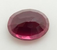 A loose oval ruby measuring approximately 8.3ct