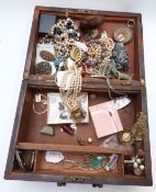 A collection of costume jewellery including Miracle brooches, silver necklaces, crystal geode etc