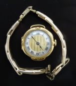 Vintage 18ct gold ladies wristwatch with blued hands, black Roman numerals, gold dial and silver