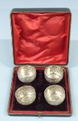 Cased set of four Victorian hallmarked silver salts with embossed decoration, Sheffield 1884,