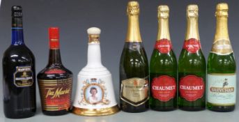 Seven bottles of assorted alcohol comprising three bottles of various sparkling perry, Tia Maria