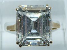 A 9ct gold ring set with and emerald cut cubic zirconia, 6.2g, size N/O