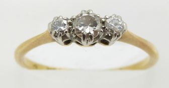 An 18ct gold ring set with three diamonds, 2.1g, size J/K
