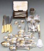 A quantity of silver plated cutlery including fiddle pattern basting spoon, spring loaded