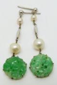 A pair of 9ct white gold Art Deco earrings set with a carved jade plaque and two pearls to each, 4.