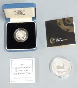 2017 silver Krugerrand and a 1994 silver proof £1 coin, both with certificates