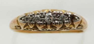 An 18ct gold ring set with diamonds, 3.6g, size H