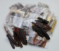 One-hundred-and-forty new leather wristwatch straps, some in original cases.