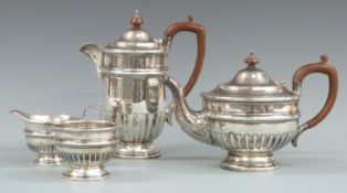 Walker & Hall George V hallmarked silver four piece teaset with lobed lower body, Sheffield 1928,
