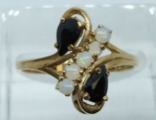 A 9ct gold ring set with sapphires and opals, 2.5g, size P