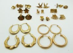 Four pairs of 9ct gold hoop earrings, 9ct gold studs, 9ct gold swallow earrings etc, 10.6g