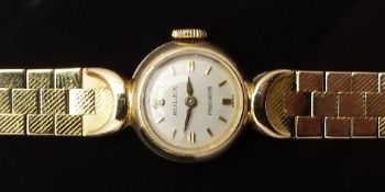 Rolex Precision 28ct gold ladies wristwatch with gold hands and baton markers, silver dial and
