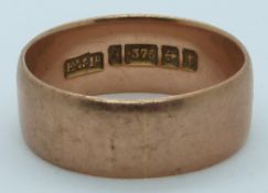 A 9ct rose gold wedding band/ring, Birmingham 1918, 6.6g, size U/V