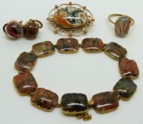 A suite of Victorian gold jewellery set with moss agate comprising bracelet, ring, earrings and