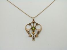Edwardian 9ct gold pendant set with a peridot and seed pearls, 3.2g