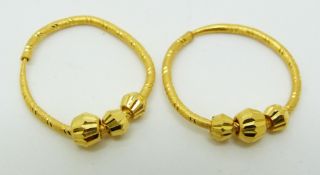 A pair of 18ct gold hoop earrings, 3.3g