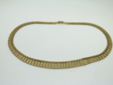 A 9ct gold Cleopatra style necklace, 31.9g