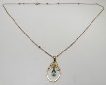 A 9ct pendant set with a pear cut aquamarine on 9ct gold chain, 2.9g
