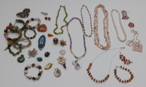 A collection of jewellery including pearls, agate, pendants etc
